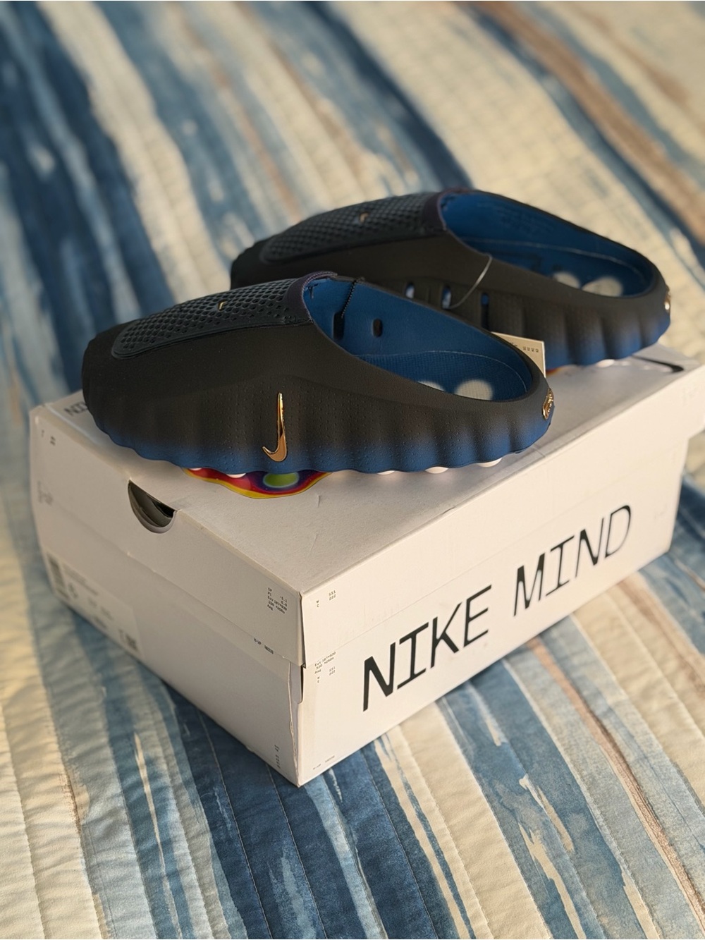 Nike Black Slip-On Loafers with Blue Interior and Gold Swoosh